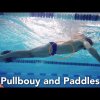 Swimming freestyle position. Pullbouy and paddles